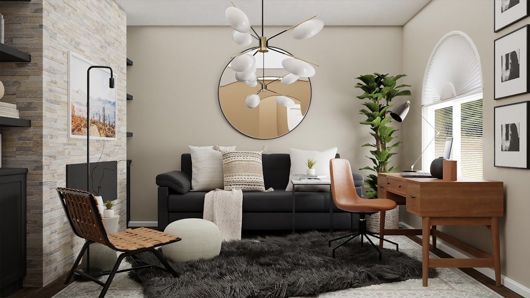 A bright and tidy living room staged for selling during the holidays, featuring a minimalist Christmas tree and a cozy fireplace, appealing to serious buyers in Castle Rock.