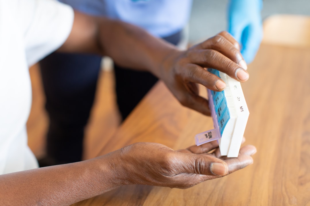 A professional close-up of one person's hand giving a set of house keys to another, symbolizing a successful and profitable home sale.