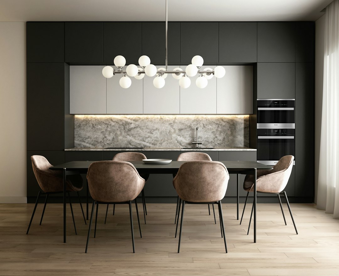 The bright and airy interior of a modern luxury kitchen with high-end finishes, representing a premium property for sale.
