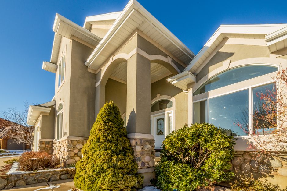 Bright, modern suburban home in Castle Rock, Colorado, basking in sunlight, representing a valuable real estate asset.